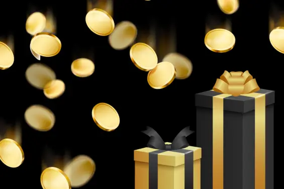 Image of a gift box with gold coins falling out.